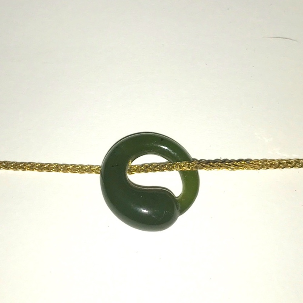 Green lucite like charm